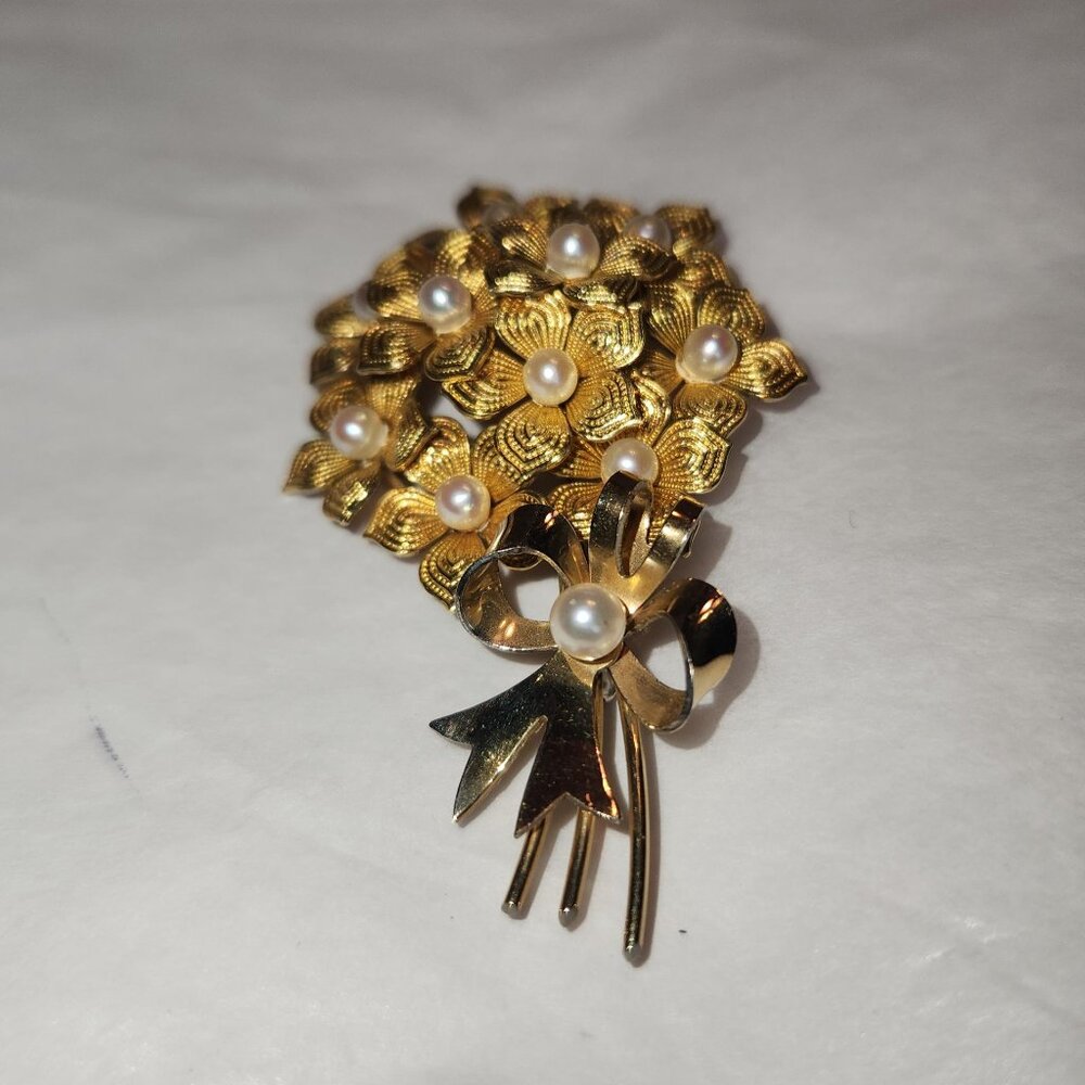Vintage Richard Krementz Goldtone bouquet of flowers pin.
